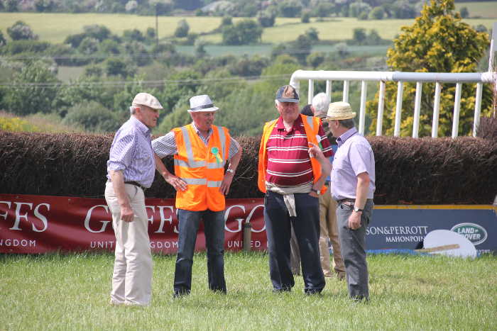 Fence stewards in discussion with Robert Tyner at Kinsale Point to Point